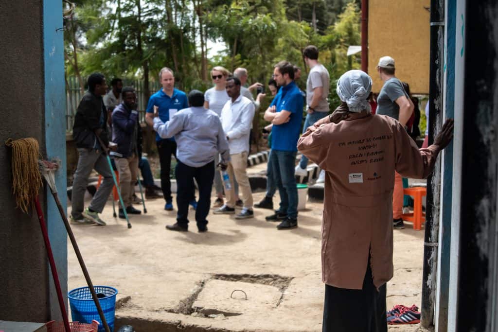 Made Blue visiting a water project