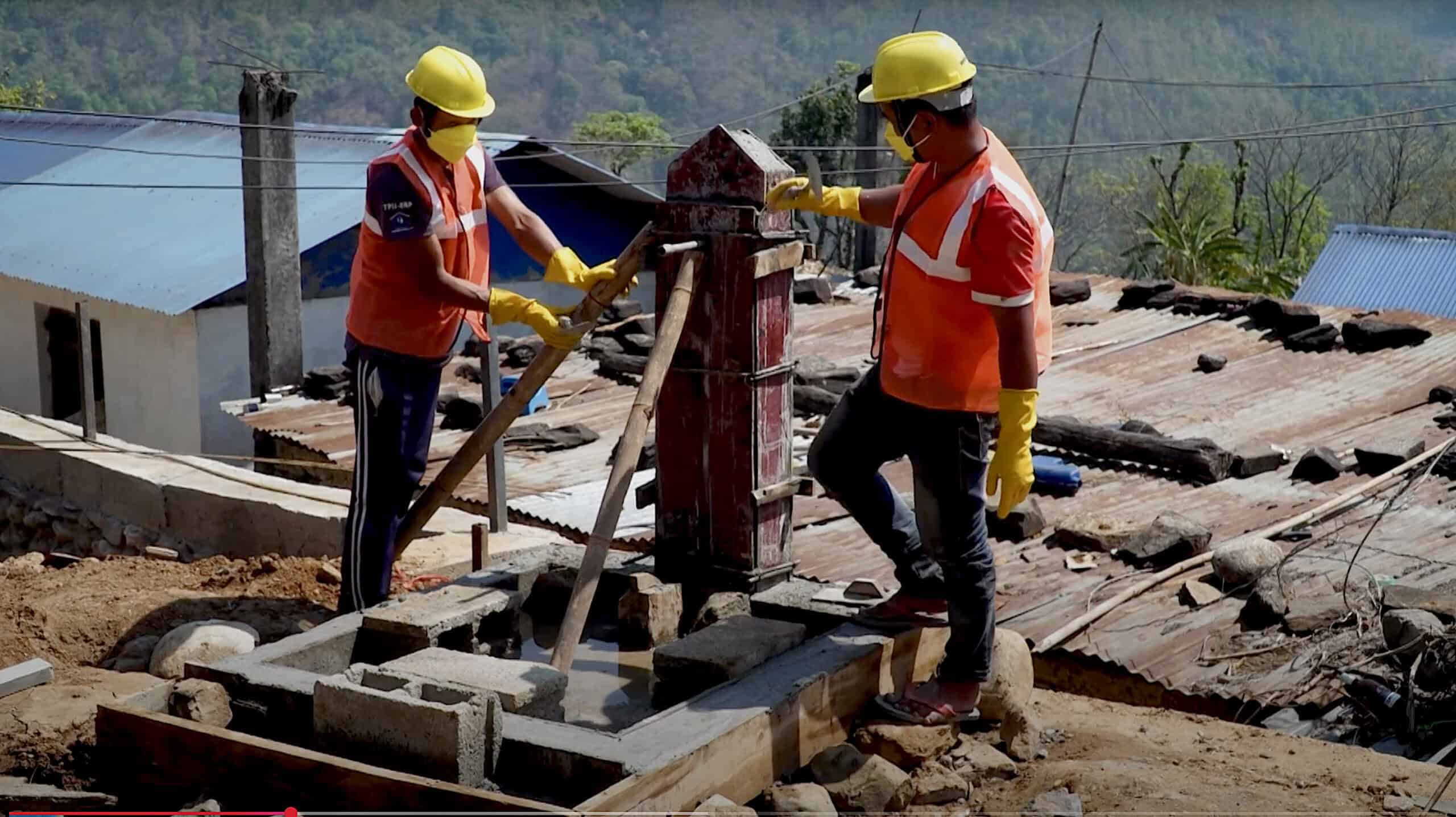 Construction workers building a Made Blue water point in Nepal